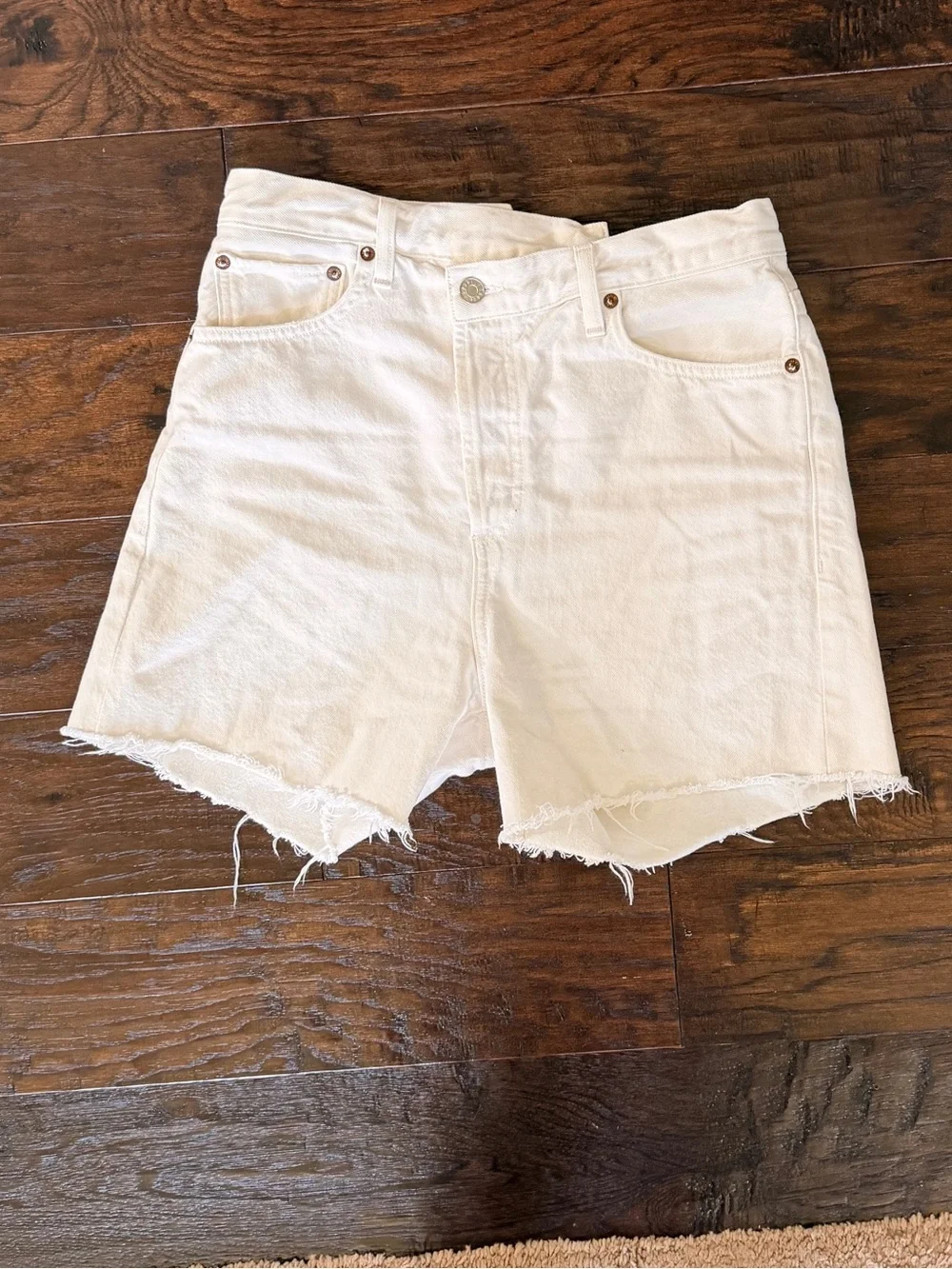 AGOLDE white denim shorts